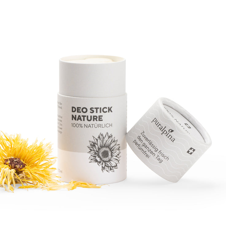 Déodorant stick Puralpina Nature 50 ml ouvert, étui en carton gris et blanc, illustration florale
