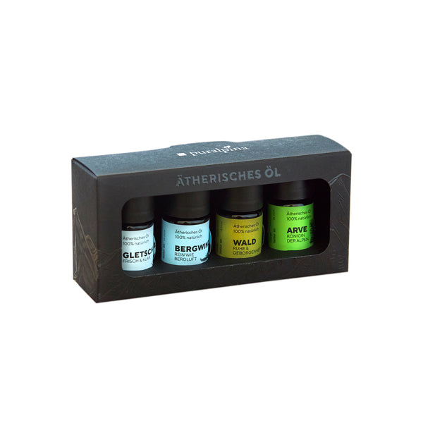 Coffret cadeau Puralpina Mountain Power contenant quatre huiles essentielles dans un emballage noir
